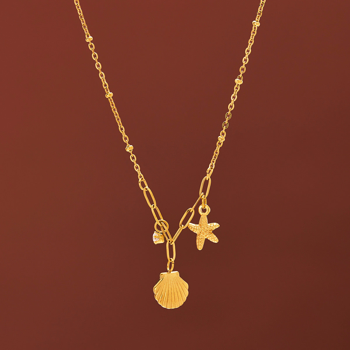 سلسلة بناتي نجمة بحر وصدفة بفص لامع – ستايل صيفي بحري