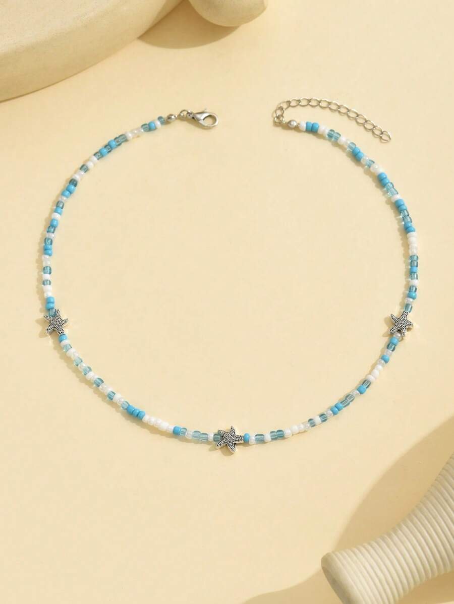 سلسلة خرز أخضر وأزرق وأبيض مع نجوم بحر – لمسة بحرية