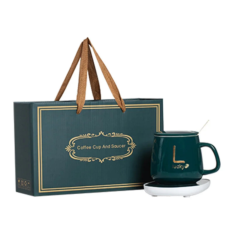 مج بورسلين حراري مزود بقاعدة تسخين ومعلقة ستانلس وشنطة هدايا