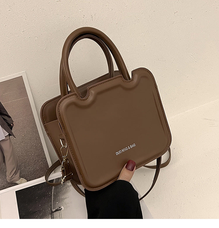 شنطة يد نسائية جلد معالج PA – تصميم أنيق وعصري