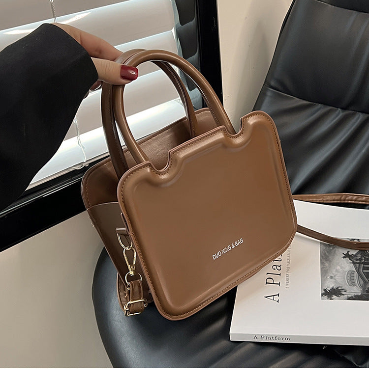 شنطة يد نسائية جلد معالج PA – تصميم أنيق وعصري