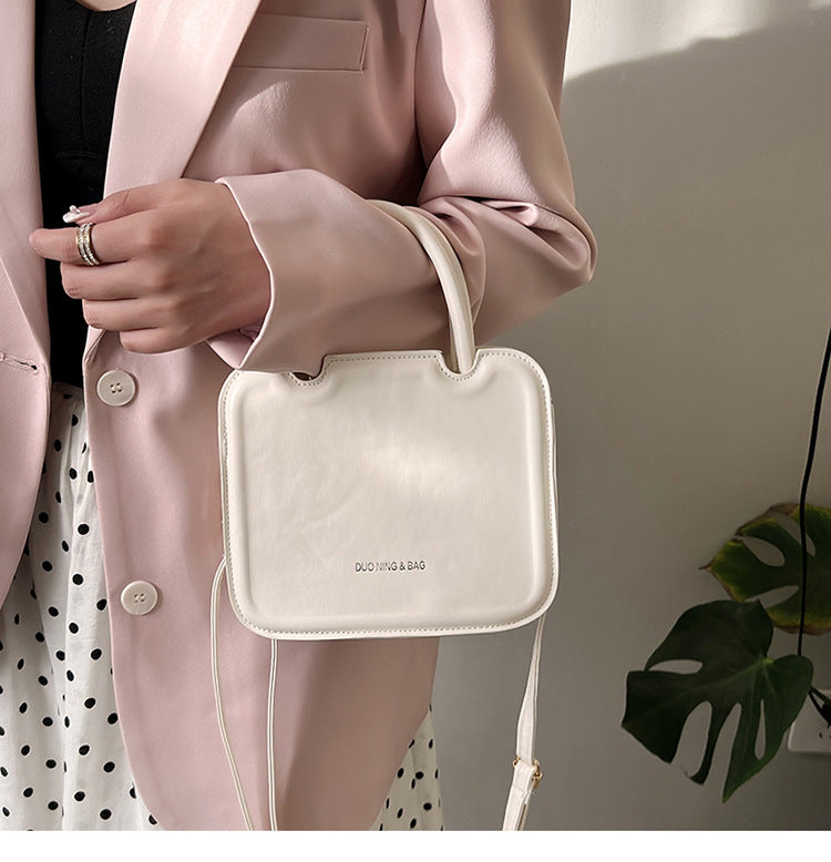 شنطة يد نسائية جلد معالج PA – تصميم أنيق وعصري