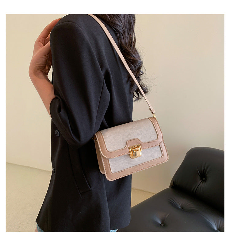 شنطة كروس جلد بتصميم أنيق بقفل ذهبي