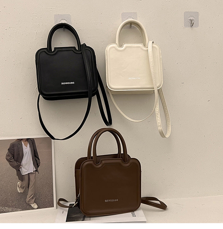 شنطة يد نسائية جلد معالج PA – تصميم أنيق وعصري