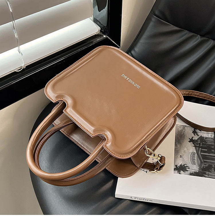 شنطة يد نسائية جلد معالج PA – تصميم أنيق وعصري