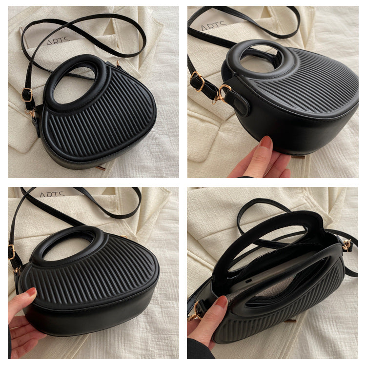 شنطة كروس بودي دائرية بمقبض دائري وتصميم مخطط