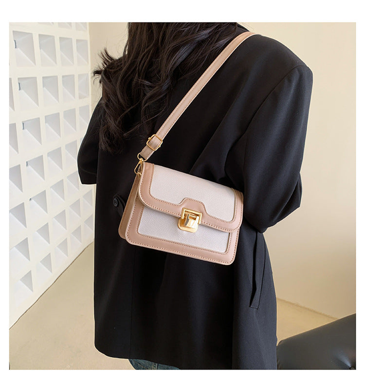 شنطة كروس جلد بتصميم أنيق بقفل ذهبي