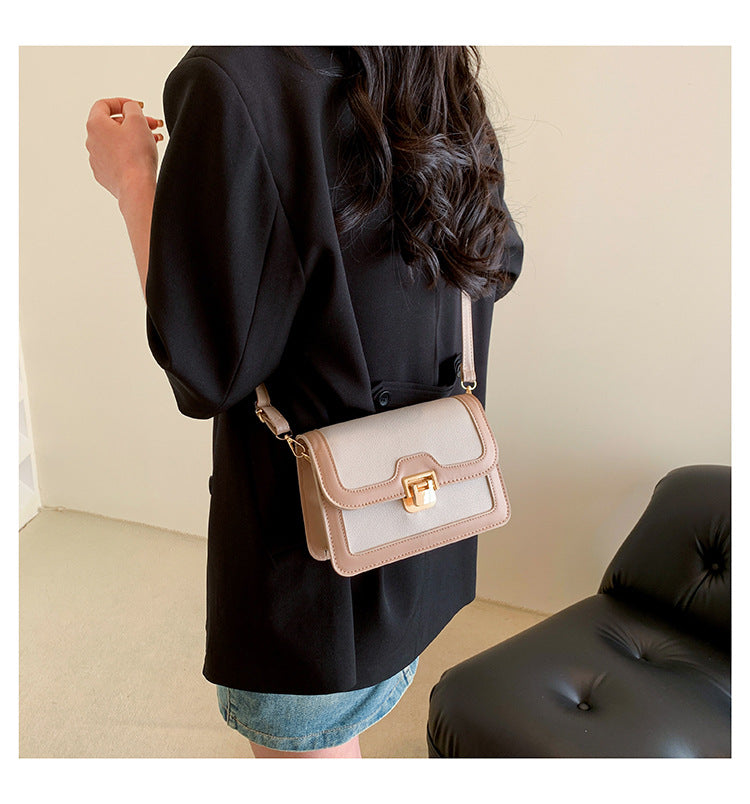 شنطة كروس جلد بتصميم أنيق بقفل ذهبي