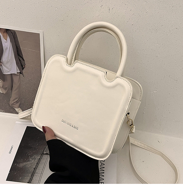 شنطة يد نسائية جلد معالج PA – تصميم أنيق وعصري