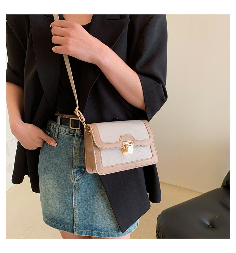 شنطة كروس جلد بتصميم أنيق بقفل ذهبي