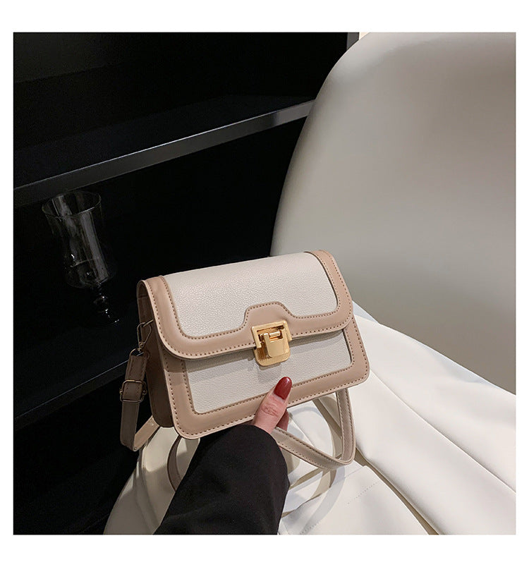 شنطة كروس جلد بتصميم أنيق بقفل ذهبي