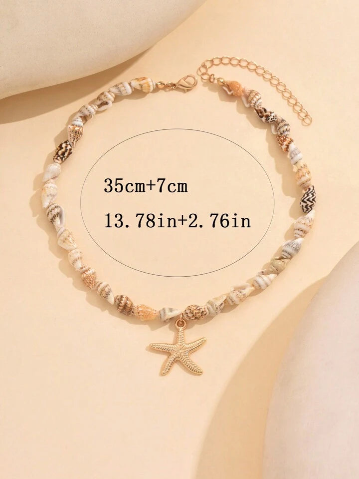 سلسلة خرز صدف طبيعي مع نجمة بحر ذهبية