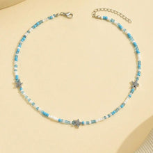 سلسلة خرز أخضر وأزرق وأبيض مع نجوم بحر – لمسة بحرية