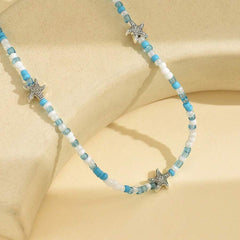 سلسلة خرز أخضر وأزرق وأبيض مع نجوم بحر – لمسة بحرية