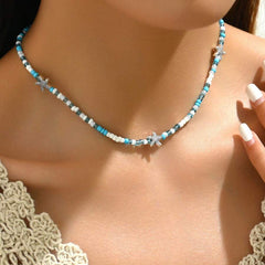 سلسلة خرز أخضر وأزرق وأبيض مع نجوم بحر – لمسة بحرية