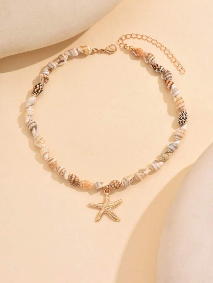 سلسلة خرز صدف طبيعي مع نجمة بحر ذهبية