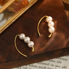 حلق نصف دائري باللؤلؤ مع إطار مطلي بماء الذهب