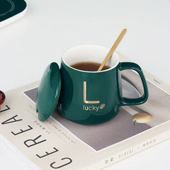 مج بورسلين حراري مزود بقاعدة تسخين ومعلقة ستانلس وشنطة هدايا