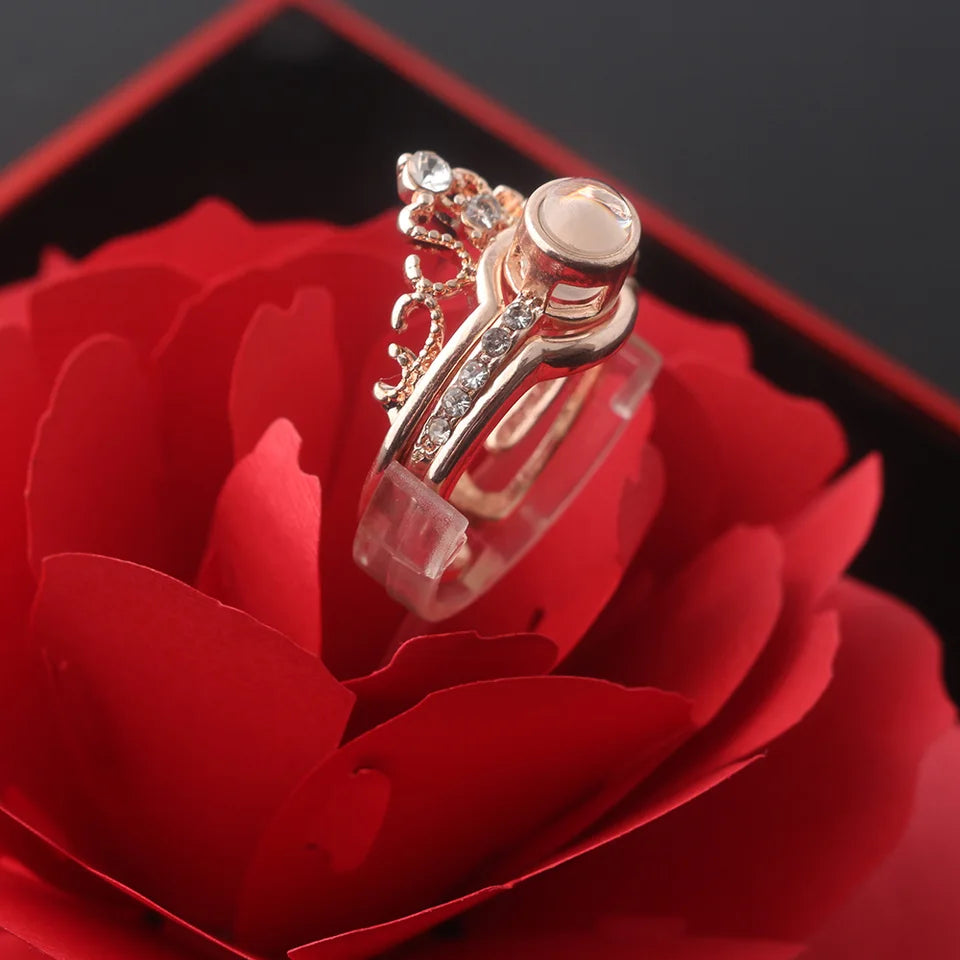 خاتم بحبك بكل لغات العالم +  علبة هدايا تفتح علي شكل وردة