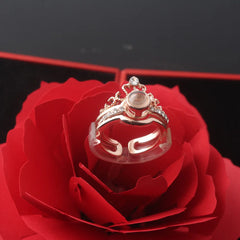 خاتم بحبك بكل لغات العالم +  علبة هدايا تفتح علي شكل وردة