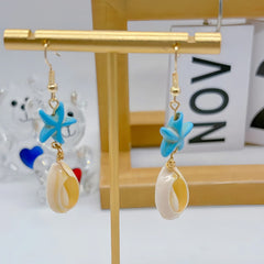 حلق بناتي طويل نجمة بحر تركواز مع صدفة – ستايل صيفي بحري