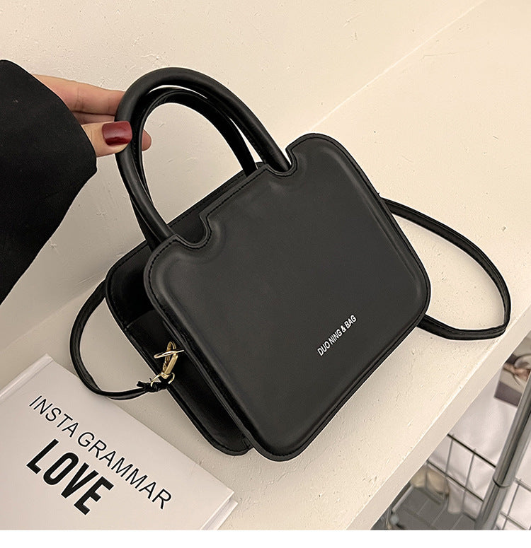 شنطة يد نسائية جلد معالج PA – تصميم أنيق وعصري