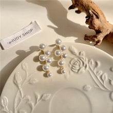 حلق لؤلؤ متدلي متعدد الطبقات – أناقة ناعمة بلمسة فاخرة