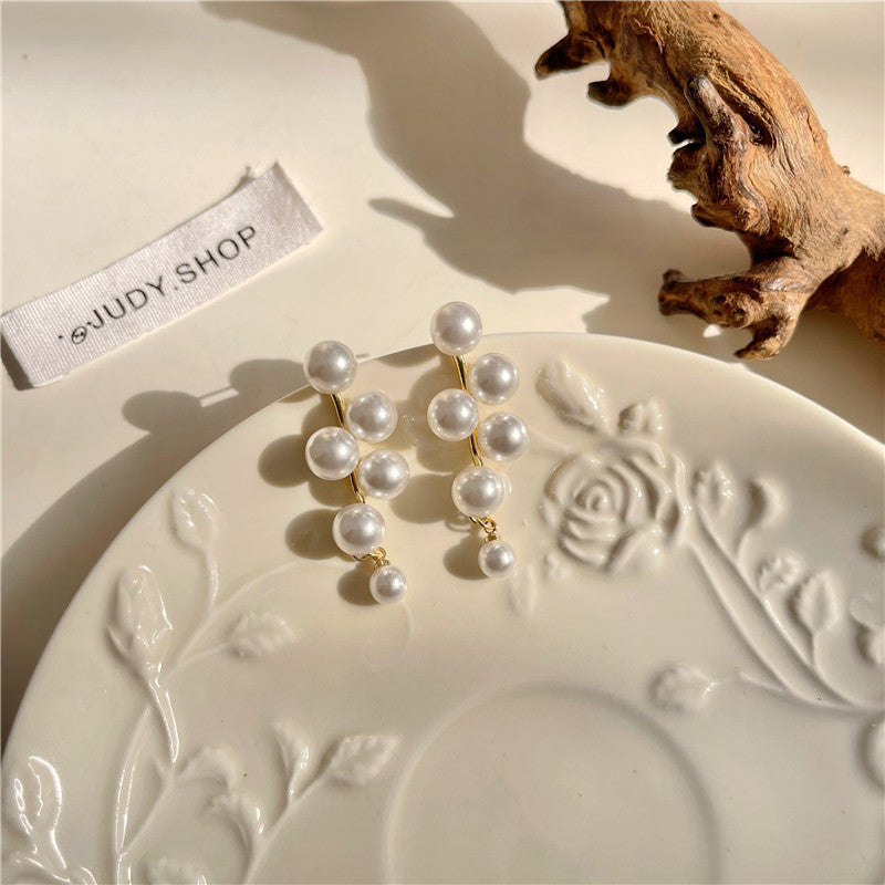 حلق لؤلؤ متدلي متعدد الطبقات – أناقة ناعمة بلمسة فاخرة