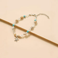 خلخال صيفي مزين بالصدف وحجر الفيروز مع قلادة نجم البحر