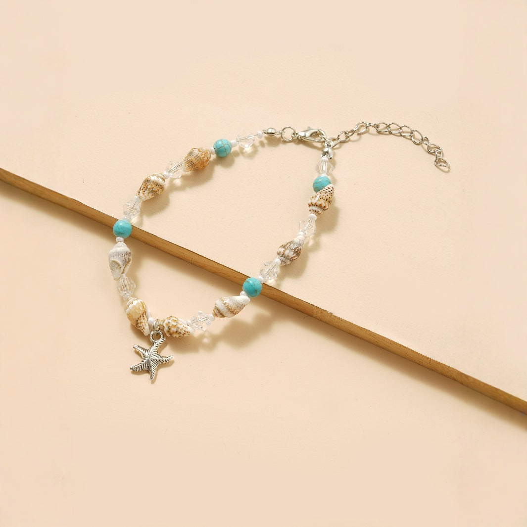 خلخال صيفي مزين بالصدف وحجر الفيروز مع قلادة نجم البحر