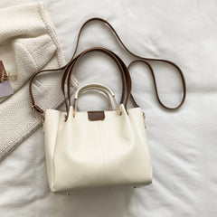 شنطة حريمي باكيت جلد معالج PU بتصميم أنيق