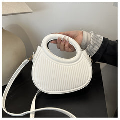 شنطة كروس بودي دائرية بمقبض دائري وتصميم مخطط