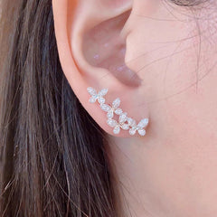 حلق أذن بتصميم فراشات مرصعة – ستايل بيرسينج أنيق ولمعان فاخر