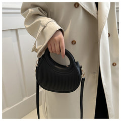 شنطة كروس بودي دائرية بمقبض دائري وتصميم مخطط